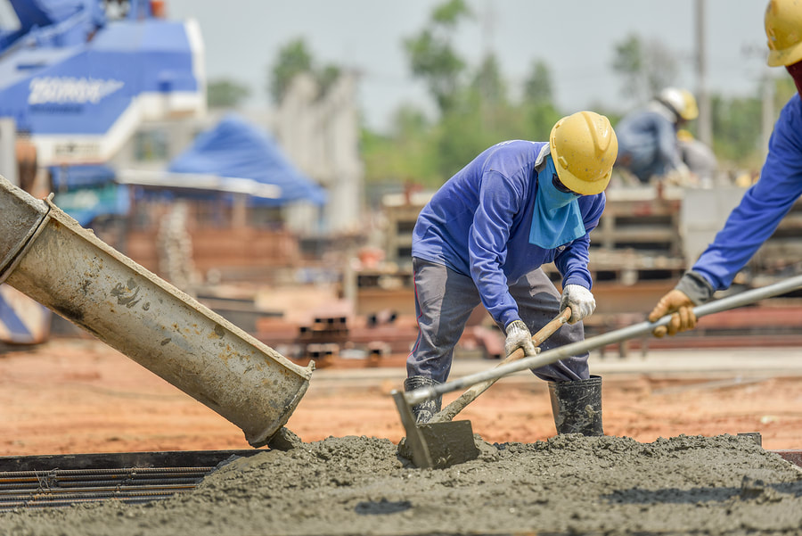 two workers using the spade